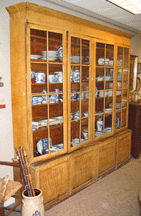 A twopart glazed tiger maple grainpainted bookcase with provenance to the A Phelps Inn brought 11163