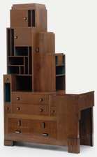 Designer Paul Theodore Frankl modeled many pieces on the Manhattan skyscraper The walnut deskbookcase soars upward in a series of carefully calibrated steps similar to the horizontal and vertical blocks of the city On loan from Boston collector John P Axelrod courtesy Museum of Fine Arts Boston