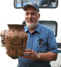 George Bernheimer of Moonstone Antiques Mansfield Mass with an Apache olla circa 18901900 Brimfield Acres North