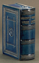 Book flasks were popular The circa 1876 one pictured is attributed to Jeffords Pottery in Philadelphia and is executed in a desirable cobalt blue glaze on a cream color body