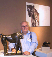 The Sladmore Gallery London organized an exhibit of Rembrandt Bugatti bronzes The display coincided with a party at New Yorks Graham Gallery to celebrate the publication of Rembrandt Bugatti Life in Sculpture by Sladmore Gallery partner Edward Horswell Horswells colleague Gerry Farrell is seen here with the shows trophy piece Hamadryas Baboon 1910