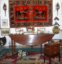 Horsethemed Royal Doulton saucers plates vases and ramekins atop a Georgian Irish mahogany hunt board at Sporting Antiques Woodbury Conn