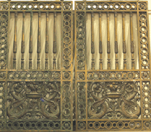 A massive pair of antique cast bronze gates from the Continental Bank Building Chicago sold for 28750