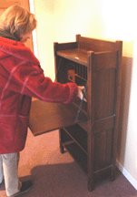 A Gustav drop front desk in a dark finish brought 9775