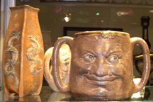 Sylvia Powell Decorative Arts of London had some fine Nineteenth Century Martin Brothers pottery including a circa 1895 loving cup with a grinning face