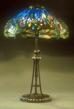 The society boasts a formidable collection of 132 Tiffany lamps and four Tiffany windows The dragonfly table lamp is a choice piece