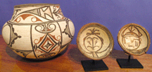 Native American artifacts including the large Zuni pot and the two Hopi bowls decorated with katchina faces were offered by a new Manhattan gallery MalloyBlitz Tribal Arts
