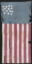 The midNineteenth Century 14star flag was hand sewn by a Maine woman with a canton of fourpointed stars that runs top to bottom of the flag It has 12 stripes rather than the conventional 13