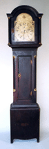 This inlaid tall clock from New Hampshire with brass works unsigned sold for 10925