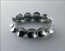 The designers who succeeded Jensen abandoned the tradition of botanical motifs and favored instead purely abstract shapes as seen in this Steffan Andersen necklace 1969 Courtesy of The Silver Fund Collection