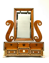 The midNineteenth Century dressing case with mirror was made by Captain James Archer for his wife Mary aboard the whaler Afton during an Atlantic voyage between 1853 and 1856 The case is constructed of mahogany inlaid with ebony ivory rosewood and whalebone and comprises some 1900 pieces