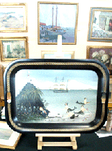 A Ralph Cahoon painted tole tray in the booth of Diamond Antiques And Fine Art West Harwich Mass