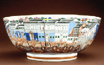 This exceptional hong bowl punch bowl is decorated with scenes of the Canton waterfront depicting foreign factories or hongs of Western merchants along the Pearl River in Canton