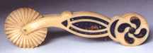 A whale ivory pie crimper with tortoise shell inlay realized 20700