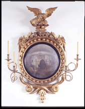 The circa 1810 giltwood girandole mirror has four arms and a nice eagle finial
