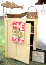 Patrick Murray Brick NJ offered this jelly cupboard in original mustard paint Draped over the cupboard door is a dated 1846 Emmaus Penn multicolored coverlet by Fehr amp Keck 445
