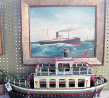 This 1930s folksy ship model 695 complemented the 1938 oil painting of a tug boat 425 above it in the booth of Tempe and Tori Hill Morris Township NJ