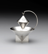 Silver manufacturers used silver plate for their more experimental models hence this unusual tea ball and stand 1928 by Paye and Baker Dallas Museum of Art the Jewel Stern American Silver Collection