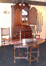 A 92inch English or Dutch oak cabinet made in England or Holland in about 1720 dominated the booth of Belmont Vt dealer Fiske and Freeman It also featured five circa 1500 carved English oak columns