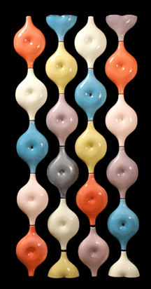 A highlight of the exhibition are these colorful belly button space dividers made of glazed porcelain by the Italian firm Manifattura Mancioli in 1958 Collection of the artist Brent C Brolin photo