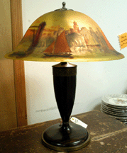 The Pairpoint lamp with reverse painted scenic shade brought 3300