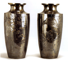 Pair of inlaid silver vases Meiji period silver vases with gold inlay in katakiribori design 25300