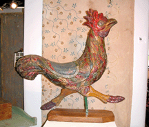 An exuberant childs carousel rooster at Eric Wohl Pomfret Conn