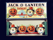 Parker Brothers JackOLantern Target game circa 1914 Made of cardboard and wood this home version of a carnival game allowed Halloween partygoers to knock over scarecrow and pumpkin heads with a ball for a prize