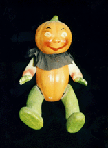 Germanmade composition Pumpkin Head Veggie doll with articulated arms and legs circa 1905