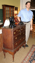 I was the only one in the locker room reading the antiques trade papers says former Red Sox pitcher Ethan Merrill who joined his father in the auction business after injuring his shoulder Brother Todd Merrill is a New York dealer in Twentieth Century design Ethan is pictured with the quirkily charming lift top pine blanket chest on a tiger maple frame that sold to show promoter Frank Gaglio for 5225