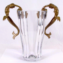 Ertes Sea Maidens a Baccarat hand blown hand cut and hand polished crystal vase insert with gilt bronze twin mermaid handles engraved Erte copyright 1985 numbered 136199 sold for 4312