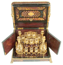 A local absentee bidder took home a French Tantalus liqueur set marked Brevete with Baccarat glasses and decanters for 3220