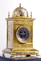The imposing Bradley amp Hubbard clock was made with brass silver plate and glass with French works The dome is Moorish in design the floral motifs on the sides are Japonesque