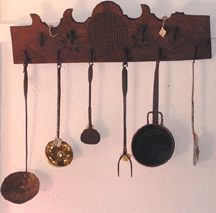 Looking like the notes on a musical scale was this collection of Eighteenth and Nineteenth Century cooking utensils seen in the booth of Ashaway Antiques Ashaway RI