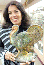 This is the best collection of doorstops that we have ever offered stated Jeanne Bertoia shown holding the Bradley and Hubbard turkey doorstop that sold for 9075
