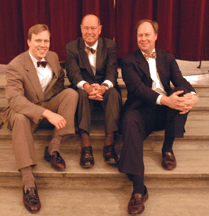 Principal and auctioneer of Freemans Samuel Beau Freeman center with two of his sons Jonathan left and Samuel