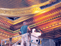Workers restoring the painted ceiling to its original BeauxArts grandeur