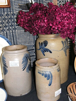 This collection of circa 1890 stoneware preserve jars with floral decoration was seen in the booth of Sandbrook Antiques Flemington NJ