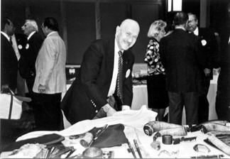 Bill arranging his table at one of the meetings of the American Society of Arms Collectors