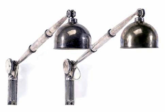 EmileJacques Ruhlmann a pair of nickeledmetal sconces circa 1934 408000