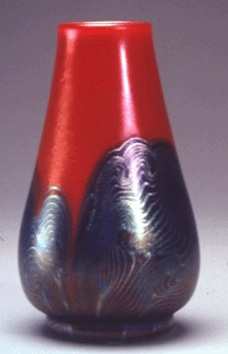 The exhibition includes both traditional favorites and littleknown works like this crimson and cobalt vase circa 1917
