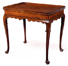 The Ladd Family Queen Anne figured and carved mahogany traytop tea table Boston circa 1750 sold for 497600 It is described as a masterpiece in The New Fine Points of Furniture by Albert Sack