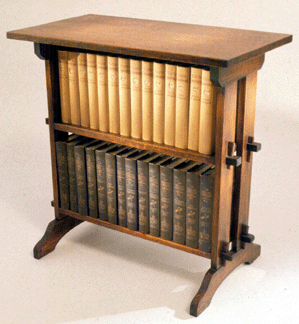 A bookrack of quartersawn oak circa 19091910 was designed specifically to house editions of Little Journeys