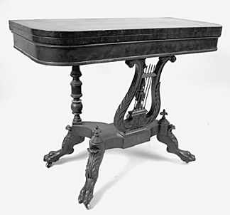 The New York mahogany games table was thought to have been made by Duncan Phyfe or a contemporary and sold for 10030