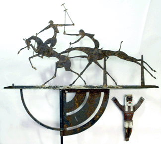 The Hunt Diedrich weathervane in the booth of Martin Cohen Watermill NY excited Americana enthusiasts