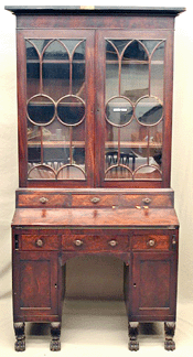 A Federal carved mahogany multipart secretarys desk after Duncan Phyfe circa 182025 sold for 3300