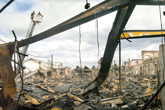 The fires aftermath Dave Johnson and Drew Clark coowners of the Stamford Antiques Center estimated the total loss as between 5 and 10 million everything from jewelry to a 165000 chandelier Photo by Andrew SullivanThe Advocate 2006 The Advocate