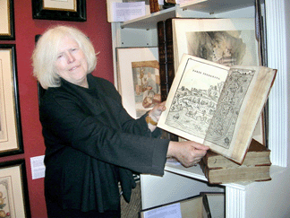 Christine Thomson of Bernard J Shapero Rare Books London displaying Giovanni Battista Ramusios Delle navigationi et viaggi the third volume entirely devoted to America The depiction of the area between New York Harbor and Narragansett Bay is based on the voyage of Giovanni da Verrazzano in 1524