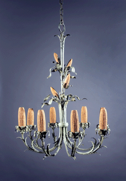 This Corn Cob Chandelier 192526 designed for an Iowa hotel dining room demonstrates Woods ability to integrate native objects into works with aesthetic quality Cedar Rapids Museum of Art