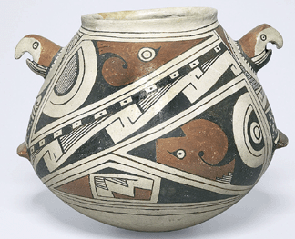 Macaw effigy vessel with a diagonal band of stepped scrolls and macawhead motifs 12801450 Casas Grandes Ramos polychrome 8 12 by 9 58 by 10 12 inches Private collection